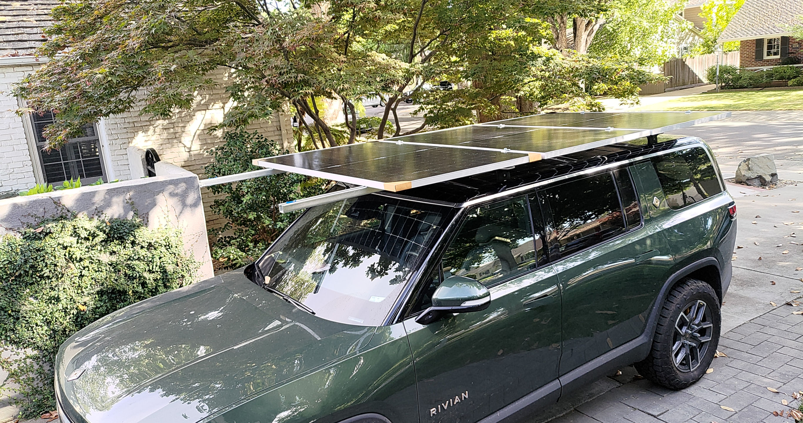 car with panels mounted, in my driveway